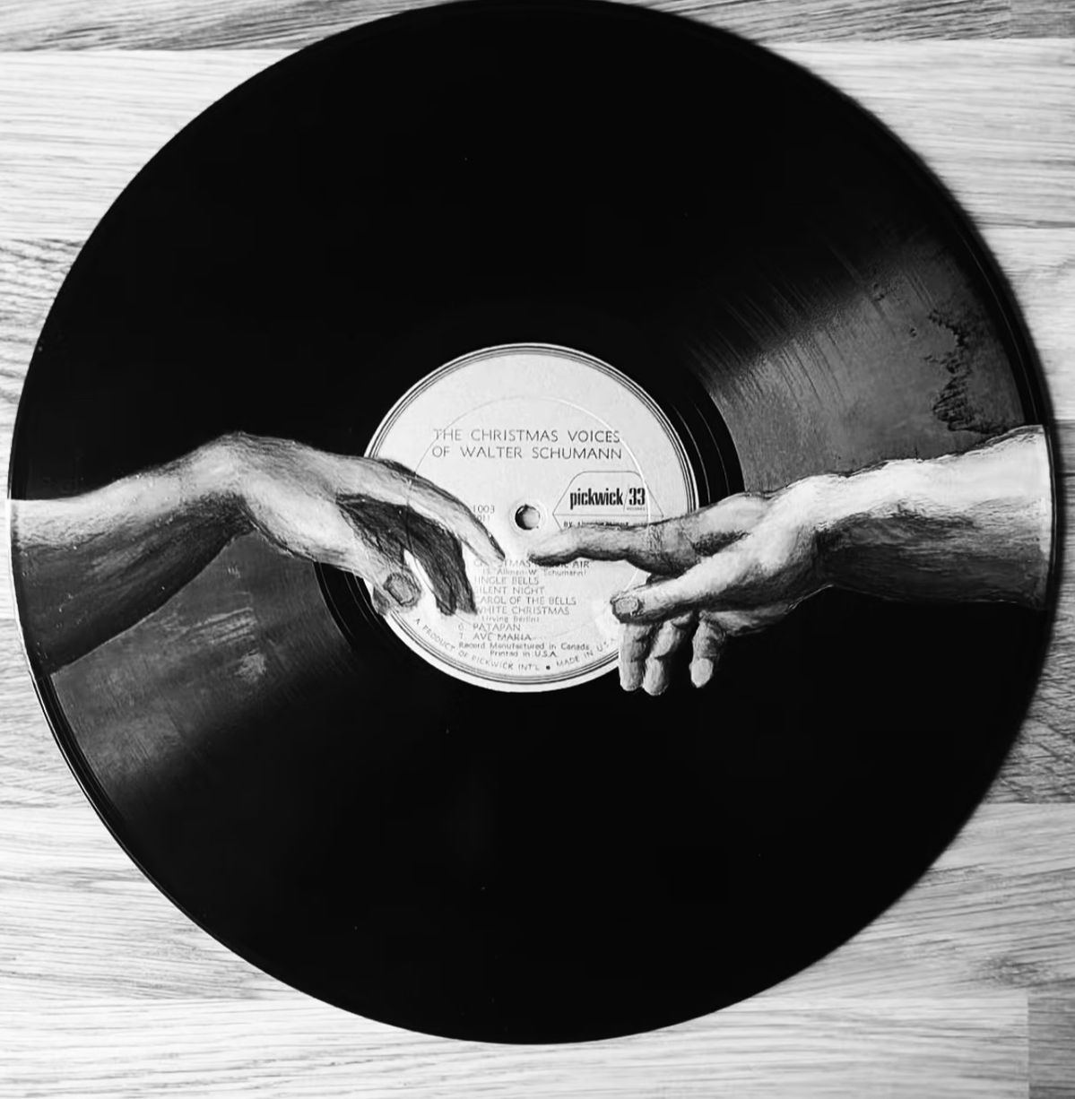 Michelangelo's creation hands painted on a vinyl record